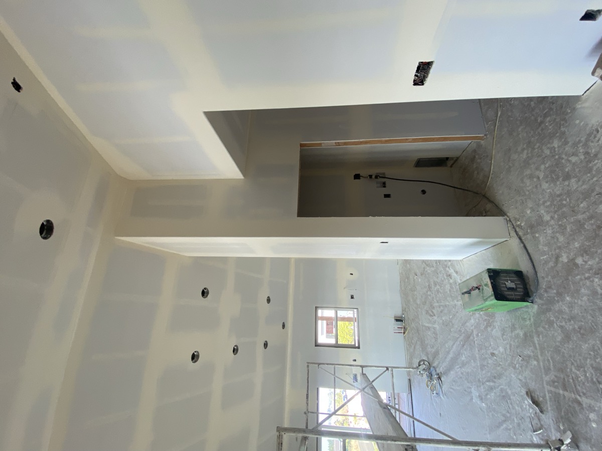 Interior mid-remodel, freshly drywalled